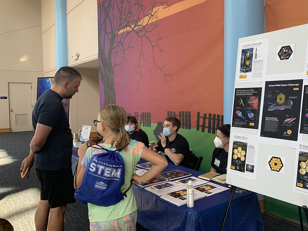 Brooke Kimsey-Miller, Brandon Radzom, and Kristin Brady providing information at STEM event
