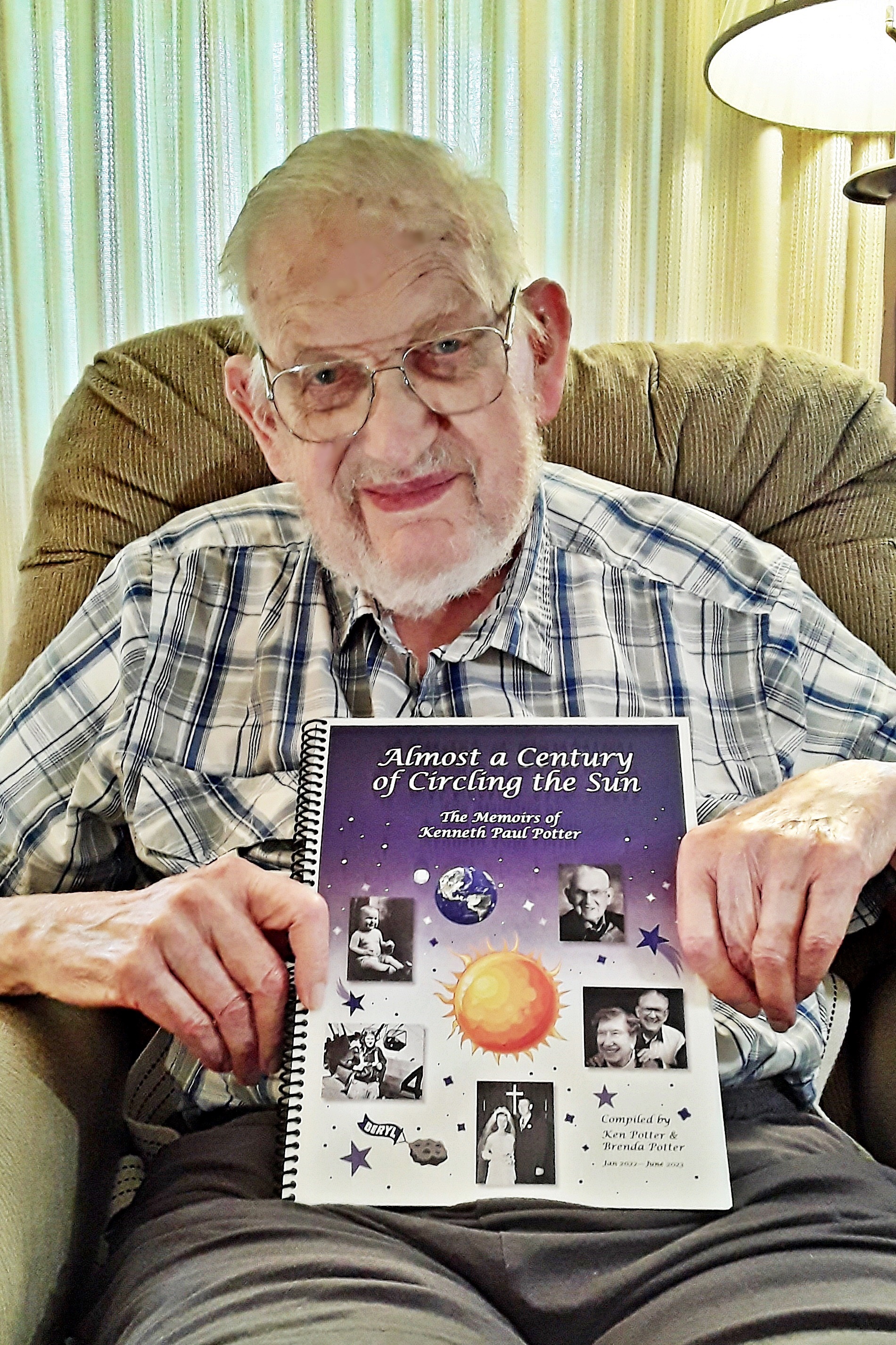 Ken Potter with his Memoir Book