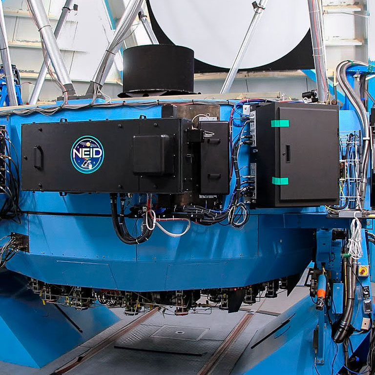 The NEID instrument, mounted on the 3.5-meter WIYN telescope at the Kitt Peak National Observatory. The NASA-NSF Exoplanet Observational Research (NN-EXPLORE) partnership funds NEID (short for NN-EXPLORE Exoplanet Investigations with Doppler spectroscopy).
Credits: NSF's National Optical-Infrared Astronomy Research Laboratory/KPNO/NSF/AURA